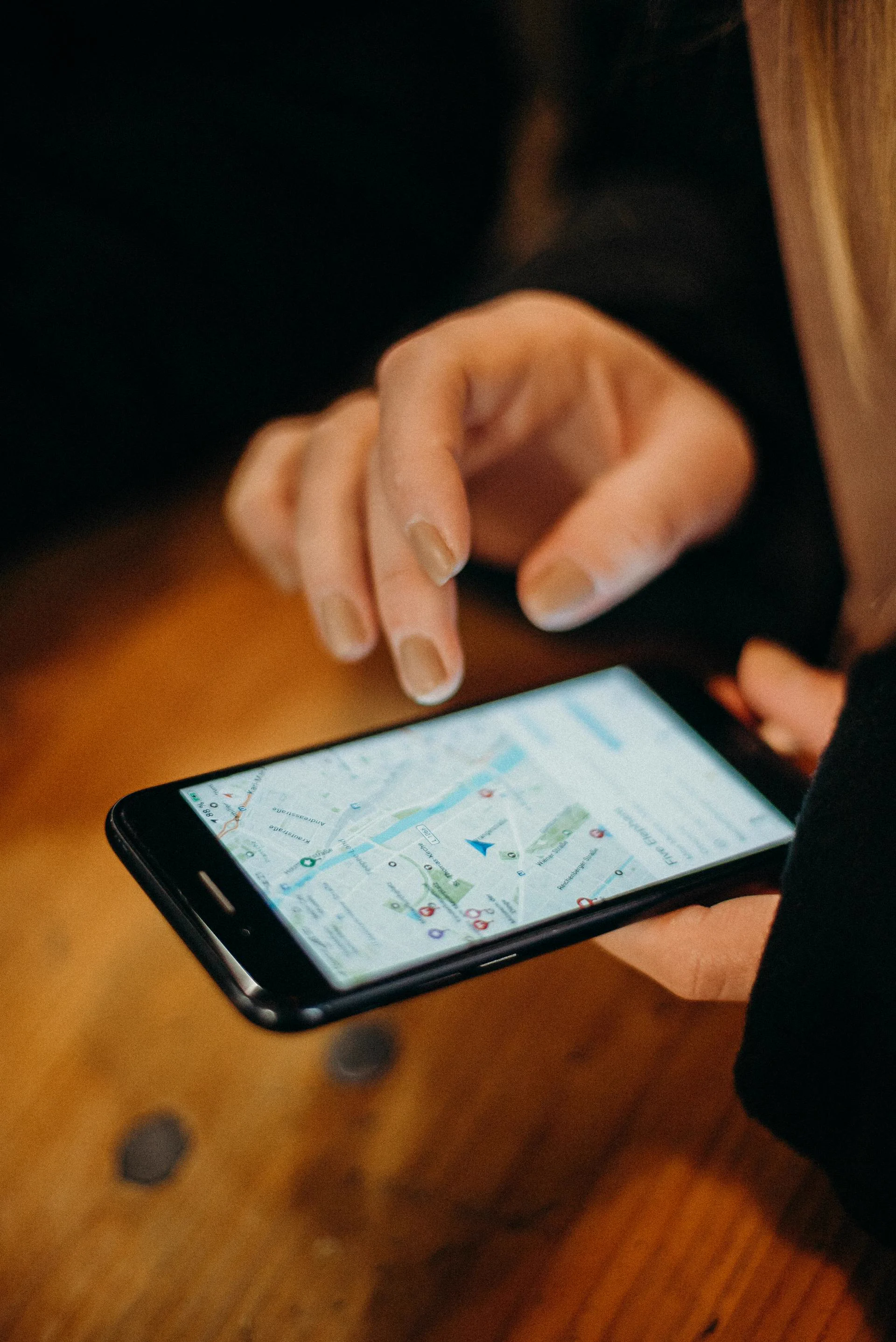 Phone displaying a map with location pins for the extracted places